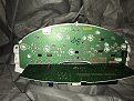 Back of cluster with secondary board tilted back. Bulbs are replaceable.